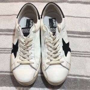 Golden Goose White Sneakers with Bold Black Star